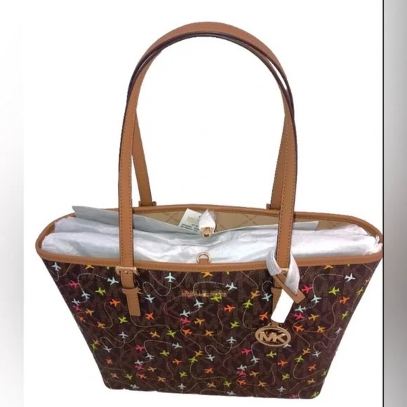 Michael Kors, airplane motif coated canvas and leather Limited ED. NWT Charm BWN - Picture 1 of 6